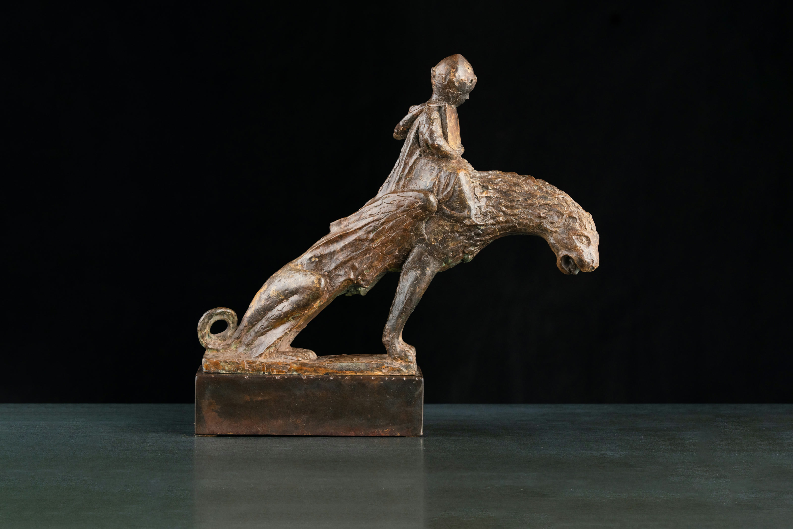 Sculpture “When Lambs Become Lions, edition 6/6”, bronze, metal // 13.4 w x 13.4 h x 5.9 d in // 2013. Artist — Sergei Oganov.